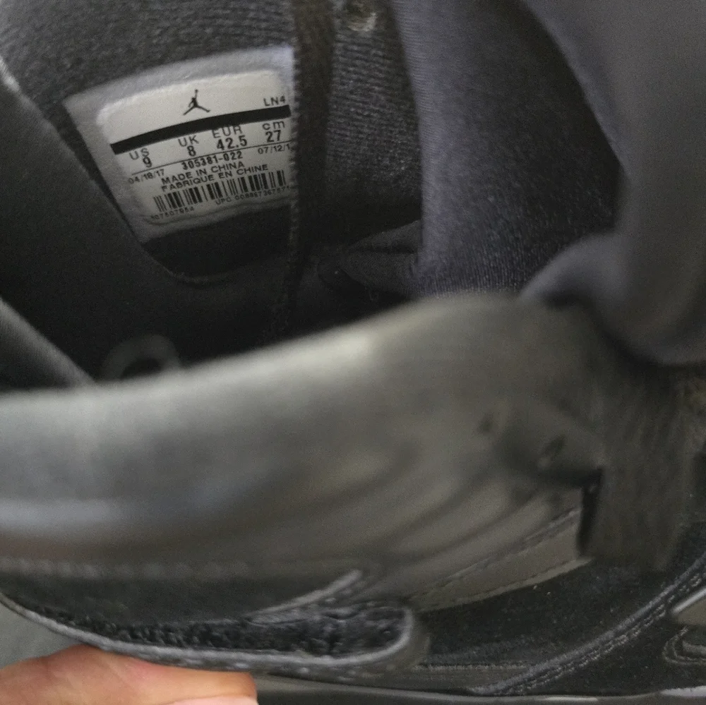 Jordan Black and Gray Sneakers with Cross-Straps...
